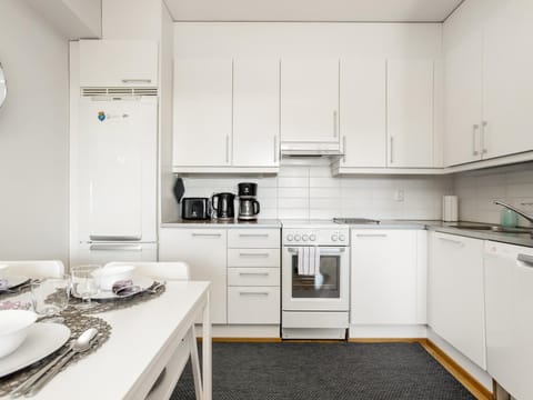 Superior Apartment, 2 Bedrooms, Sauna, Courtyard View | Private kitchen | Coffee/tea maker, electric kettle, dining tables