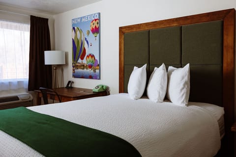 Deluxe Room (Non-Pet Friendly) | Individually furnished, blackout drapes, iron/ironing board