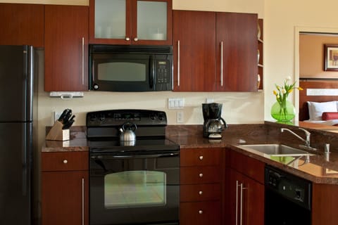 Family Condo, 2 Bedrooms, Kitchen | Private kitchen | Microwave, coffee/tea maker