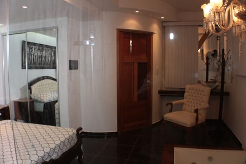 Luxury Double Room | Minibar, in-room safe, iron/ironing board, bed sheets