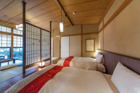 Main Building IORI - Triple Room with Partial Open-air Hot Spring Bath	 | In-room safe, free WiFi