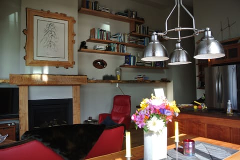 Books galore. Relax in the living room in front of the gas fireplace.