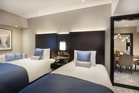 Premium bedding, free minibar items, in-room safe