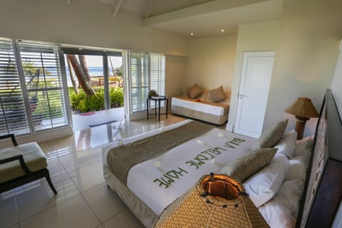 Deluxe Beachfront Bure | In-room safe, blackout drapes, iron/ironing board, WiFi