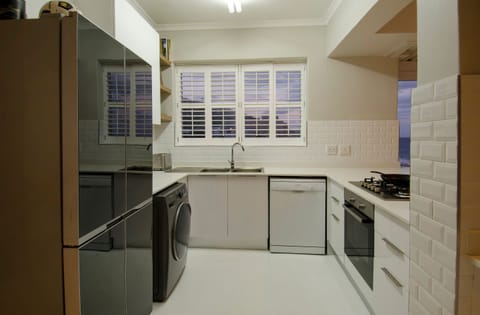 Superior Apartment, 2 Bedrooms, Ocean View, Beachfront | Private kitchen | Full-size fridge, microwave, oven, stovetop