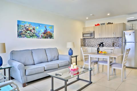 Condo, 1 Bedroom | Living area | Flat-screen TV