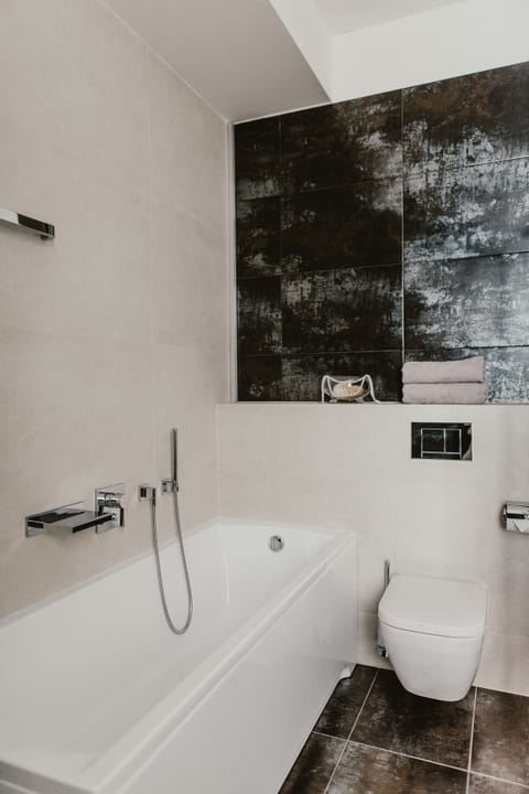 Deluxe Apartment, Terrace | Deep soaking bathtub