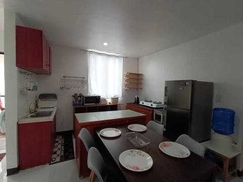 Basic Condo, 3 Bedrooms, Courtyard View | Private kitchen | Full-size fridge, microwave, stovetop, coffee/tea maker