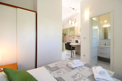 Apartment, 1 Bedroom (734/1717) | Desk, iron/ironing board, bed sheets