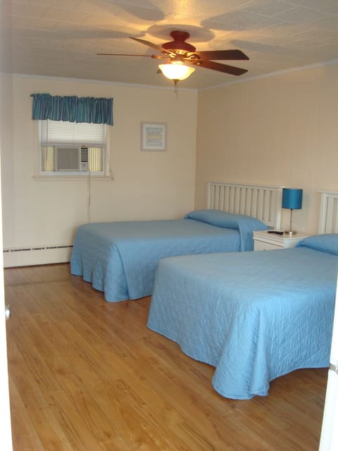 Basic Double Room, 2 Double Beds, Refrigerator & Microwave, Pool View | Iron/ironing board, free WiFi, bed sheets