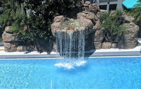 Outdoor pool, open 8:00 AM to 9:00 PM, pool umbrellas, sun loungers