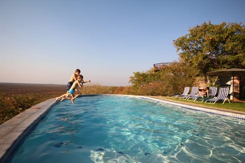 2 outdoor pools, pool umbrellas, sun loungers