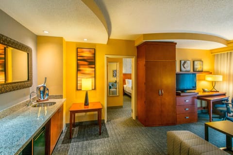 Suite, 1 Bedroom, Non Smoking | Living room | 32-inch Smart TV with cable channels, TV, Netflix