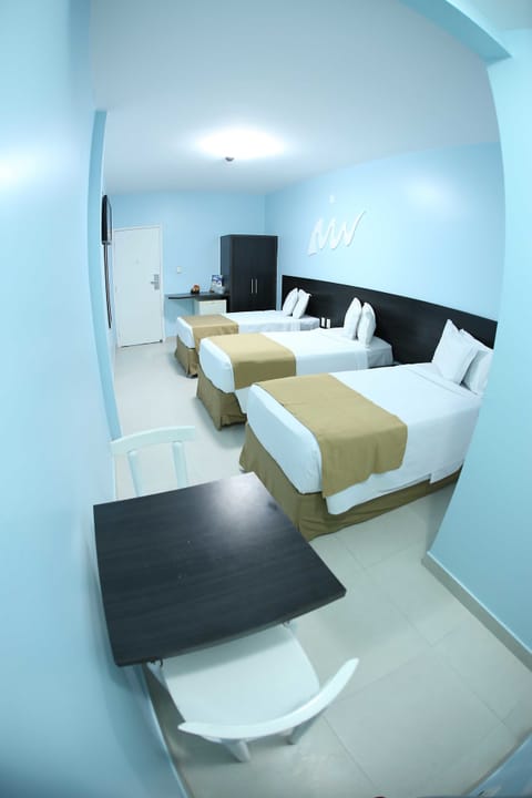 Standard Triple Room | Minibar, in-room safe, blackout drapes, free WiFi