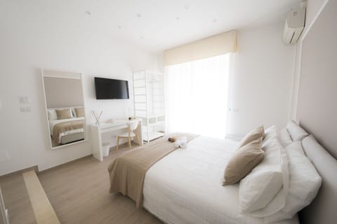 Superior Double Room, Partial Sea View | Premium bedding, down comforters, minibar, desk