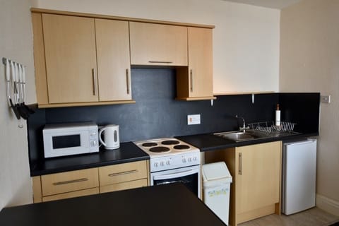 Apartment, 1 Bedroom, Sea View (Second Floor) | Private kitchen | Full-size fridge, microwave, oven, stovetop