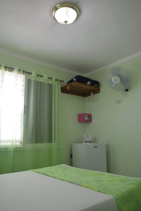 Basic Double Room | Minibar, in-room safe, iron/ironing board, bed sheets
