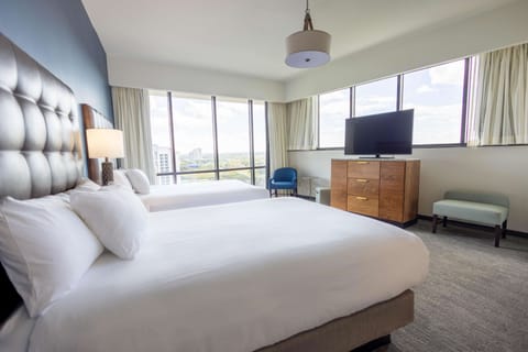 Suite, Multiple Beds (Oversized, No Resort Fee) | Premium bedding, in-room safe, desk, laptop workspace