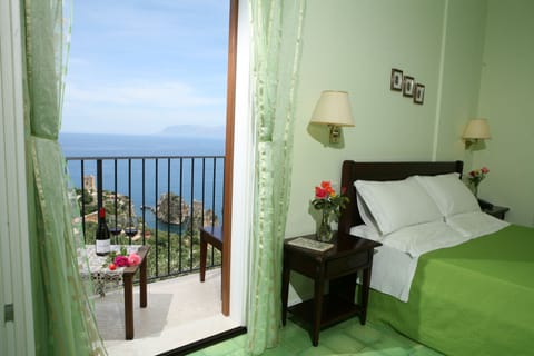 Double Room, Balcony, Sea View | Minibar, in-room safe, individually furnished, desk