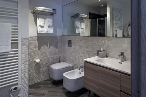 Shower, free toiletries, hair dryer, bathrobes