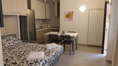 Studio | 1 bedroom, down comforters, in-room safe, desk