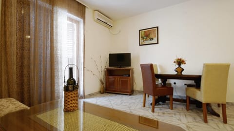 Apartment, 1 Bedroom, Terrace | Living area | Flat-screen TV, table tennis