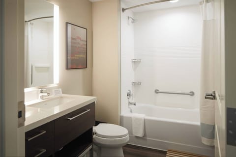 Studio, 2 Queen Beds | Bathroom | Combined shower/tub, hair dryer, towels