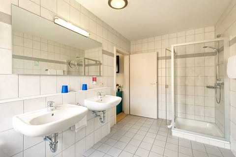 Apartment | Bathroom | Deep soaking tub, free toiletries, hair dryer, towels