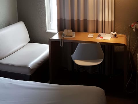 Desk, blackout drapes, soundproofing, iron/ironing board