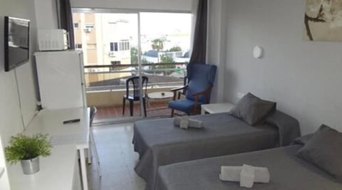 Double room with Fan and Terrace | Desk, blackout drapes, iron/ironing board, free WiFi