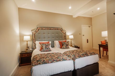 Classic Twin Room | Premium bedding, desk, blackout drapes, iron/ironing board