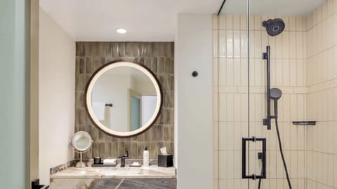 Designer toiletries, hair dryer, bathrobes, towels