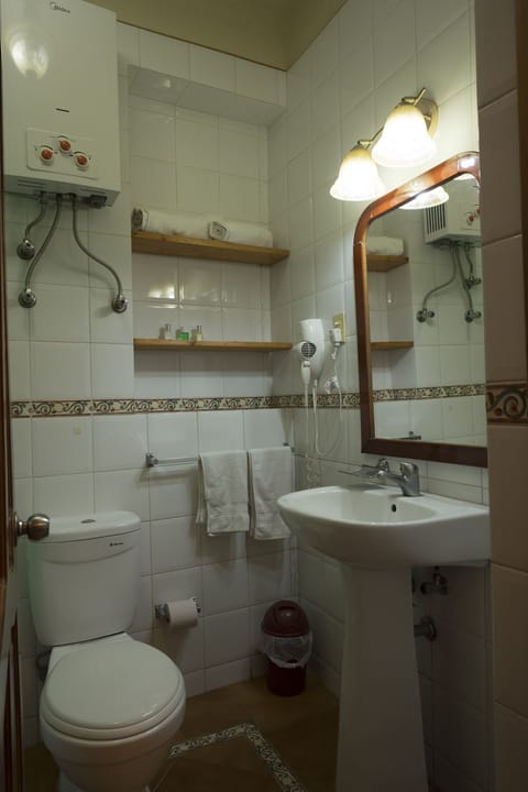 Double Room, Balcony | Bathroom | Shower, free toiletries, hair dryer, towels
