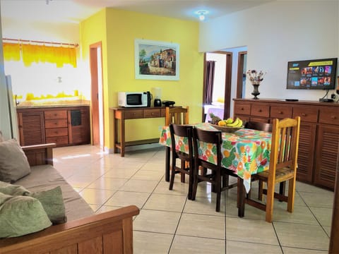 Comfort Apartment | Living area | 32-inch flat-screen TV with satellite channels, TV