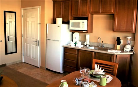 Studio, 1 King Bed with Sofa bed, Non Smoking | Private kitchenette | Full-size fridge, microwave, coffee/tea maker, toaster