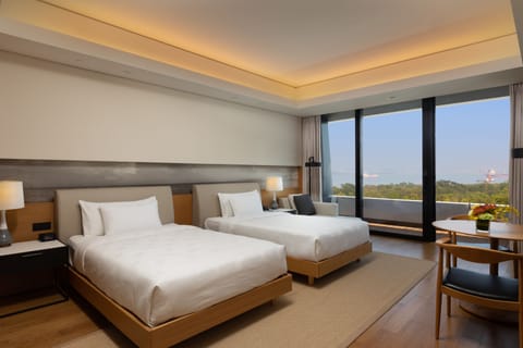Executive Twin Room with Garden View | Minibar, in-room safe, individually decorated, desk