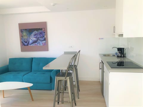 Standard Apartment, 1 Bedroom, Sea View | Living area | Flat-screen TV