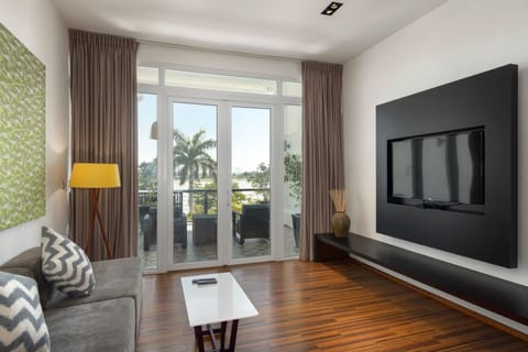 Signature Loft | Living area | 50-inch Smart TV with satellite channels, TV