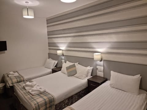 Family Room | In-room safe, iron/ironing board, cribs/infant beds, free WiFi