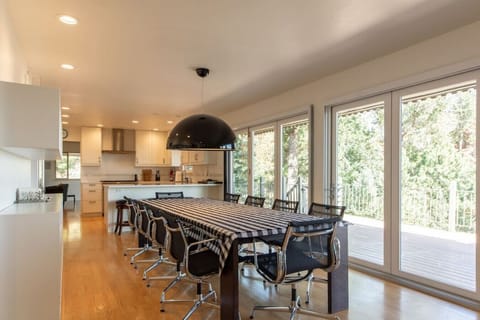 Spacious indoor/outdoor dining room and table