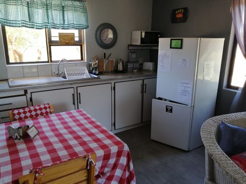 Family Chalet | Private kitchen | Full-size fridge, microwave, electric kettle, toaster