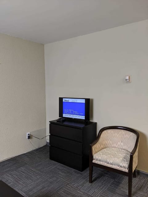 Premium Room | Living area | Flat-screen TV