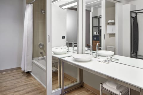 Suite, 1 Bedroom, River View | Bathroom | Designer toiletries, hair dryer, towels