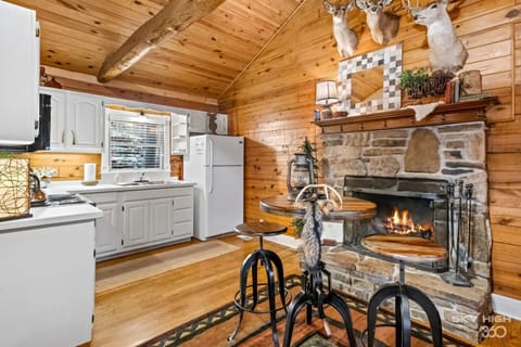 Honeymoon Cabin, 1 King Bed, Jetted Tub, Hill View (The Whitetail) | Private kitchen | Fridge, microwave, oven, stovetop