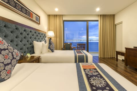 Premier Twin Room, Balcony, Oceanfront | Premium bedding, minibar, in-room safe, blackout drapes