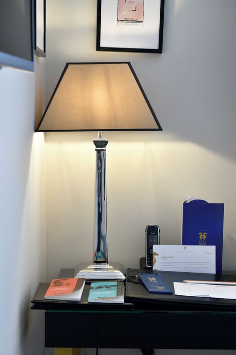 Hypo-allergenic bedding, free minibar, in-room safe, desk