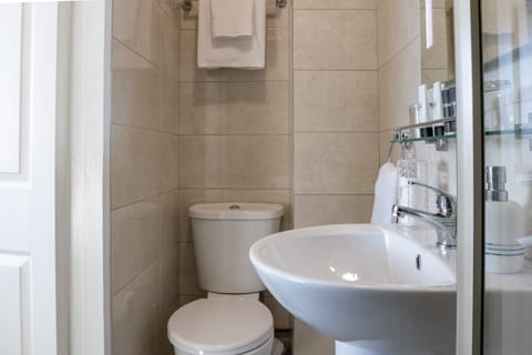 Shower, free toiletries, hair dryer, towels