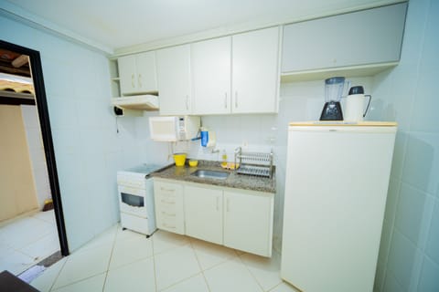 Family Apartment | Private kitchen | Full-size fridge, microwave, oven, stovetop