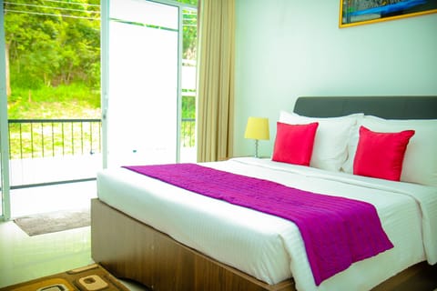 Deluxe Double Room, Pool View | In-room safe, desk, soundproofing, iron/ironing board