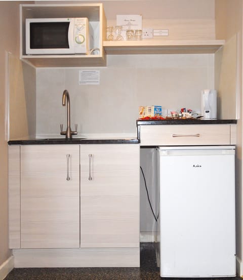 Fridge, microwave, coffee/tea maker, electric kettle